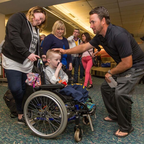 Graeme greets families on arrival in Orlando, March 2015.