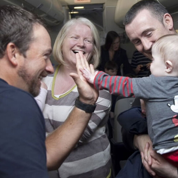 Graeme greets a family as they arrive in Orlando, March 2013.