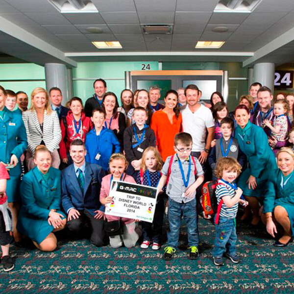 Children and their families arrive in Orlando, March 2014.