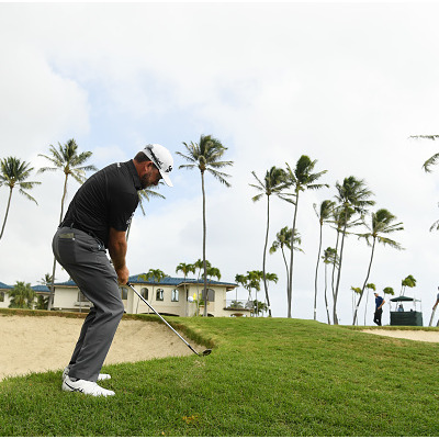 HONOLULU, HAWAII - JANUARY 09: Graeme McDowell of Northern Ireland plays a shot on the 16th hole during the first round of the Sony Open in Hawaii at the Waialae Country Club on January 09, 2020 in Honolulu, Hawaii. (Photo by Harry How/Getty Images)