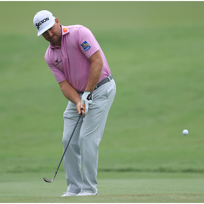 MEMPHIS, TENNESSEE - AUGUST 01: Graeme McDowell of Northern Ireland chips on to the first green during the third round of the World Golf Championship-FedEx St Jude Invitational at TPC Southwind on August 01, 2020 in Memphis, Tennessee. (Photo by Andy Lyons/Getty Images)